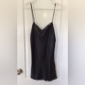 Women’s black short slip in a size medium.